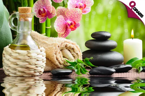 For QR150 Revel in Deep Relaxation for 60 Minutes with a Warm Stone Massage OR a Balinese Massage - for Men & Women! (QR300 Value)